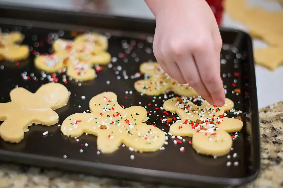 Golden baked pastry bites on a baking sheet cooling after oven